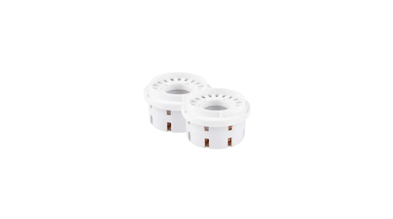 Sada dvou bílých kulatých filtrů ke zvlhčovači vzduchu Rohnson R-9518CF s perforovaným krytem.