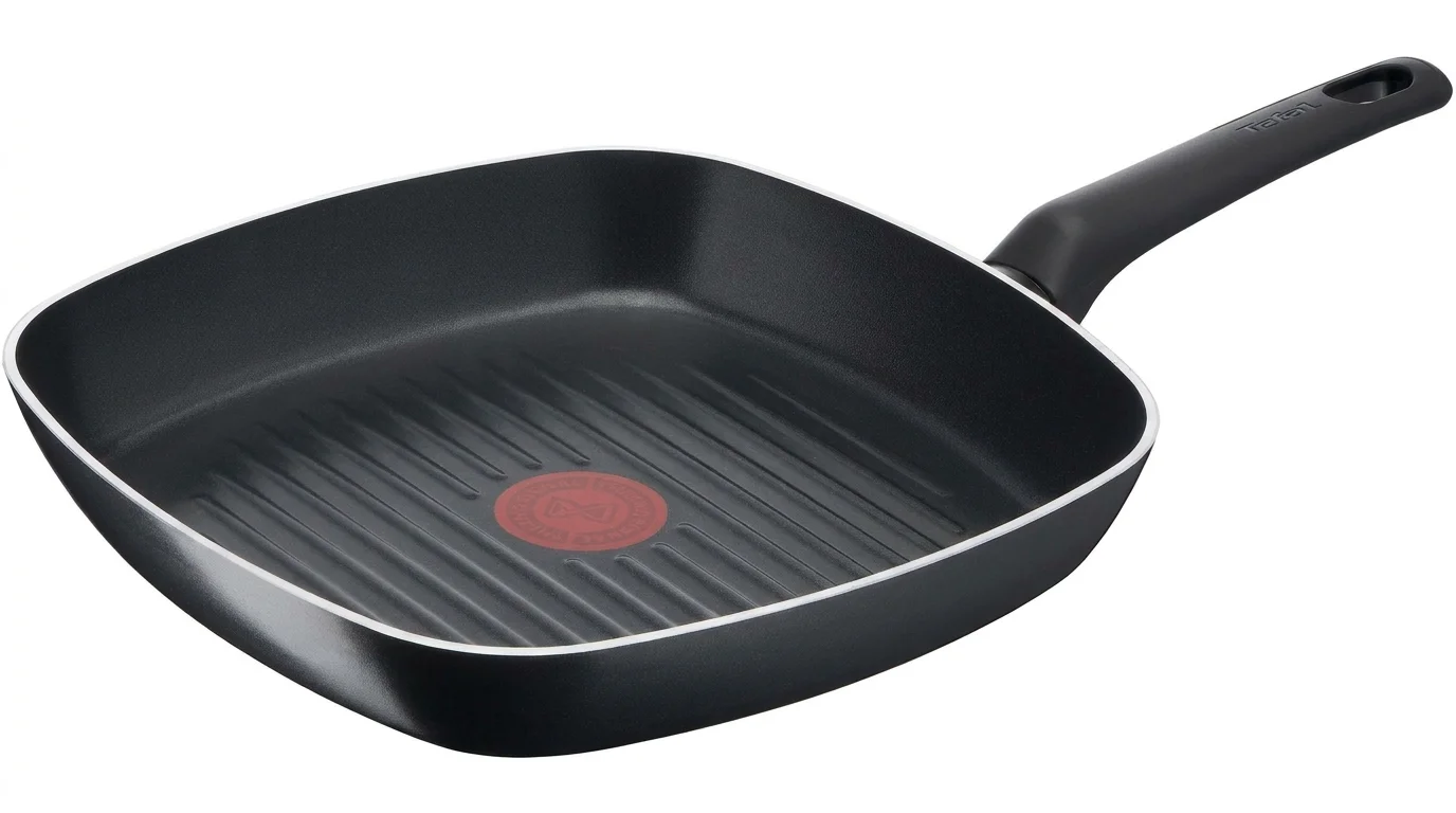 Čtvercová černá grilovací pánev Tefal s vroubkovaným povrchem a červeným indikátorem uprostřed.
