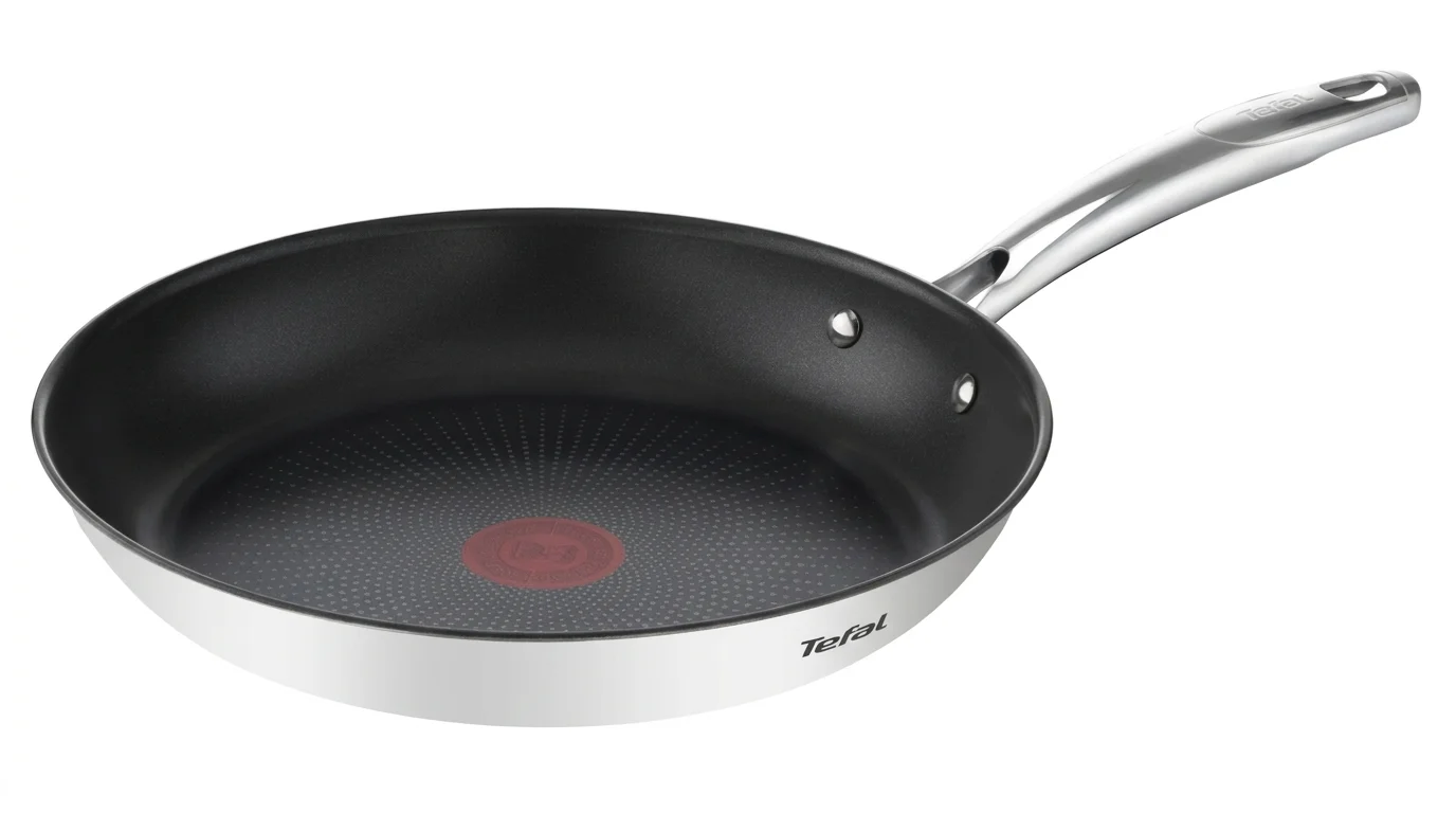Nerezová pánev Tefal Duetto+ s černým nepřilnavým povrchem, indikátorem Thermo-Signal a kovovou rukojetí.