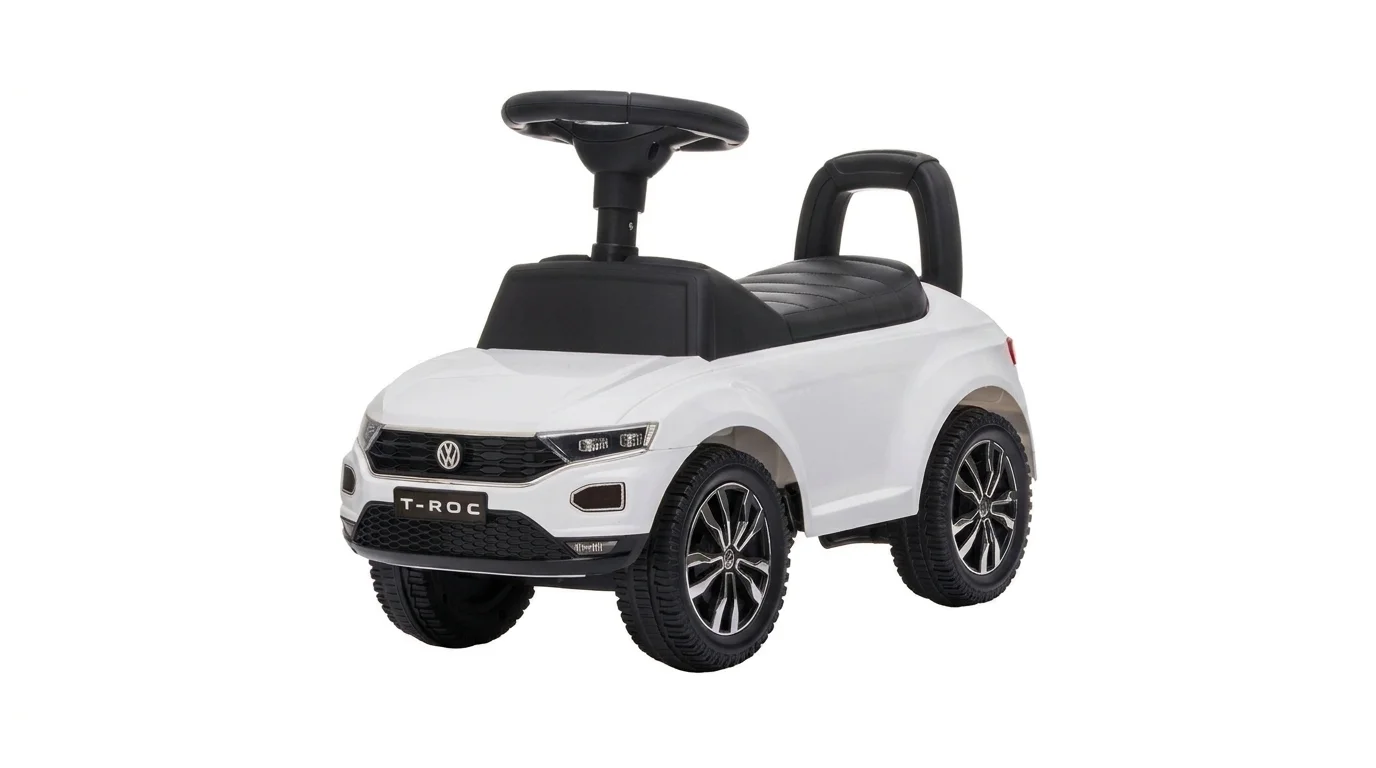 Bílé dětské odrážedlo Buddy Toys VW T-ROC s černým volantem, sedadlem a zádovou opěrkou.