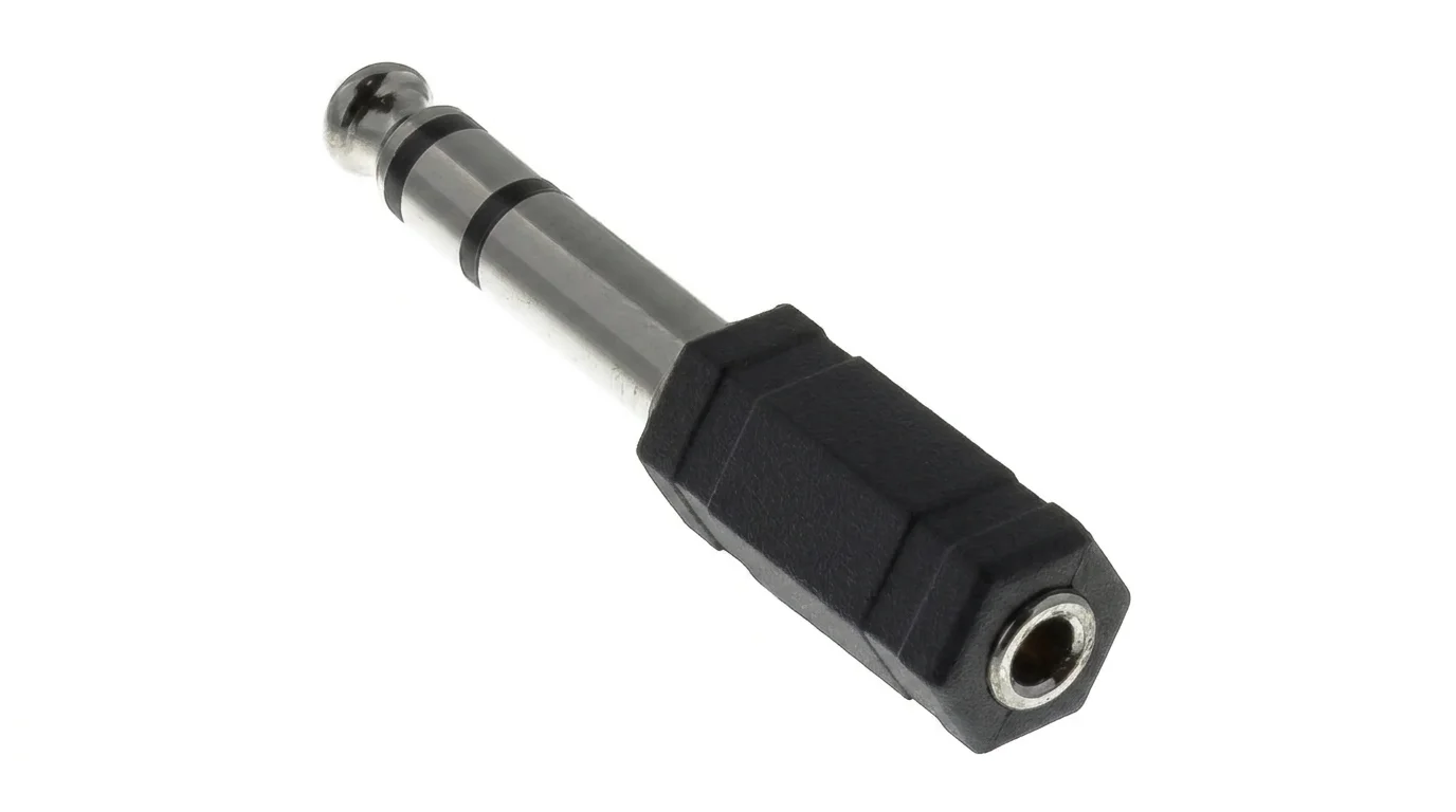 Adaptér pro sluchátka Sencor SAV 117-000 s kovovým konektorem 6,35 mm Jack a černým tělem se zdířkou 3,5 mm Jack na bílém pozadí.
