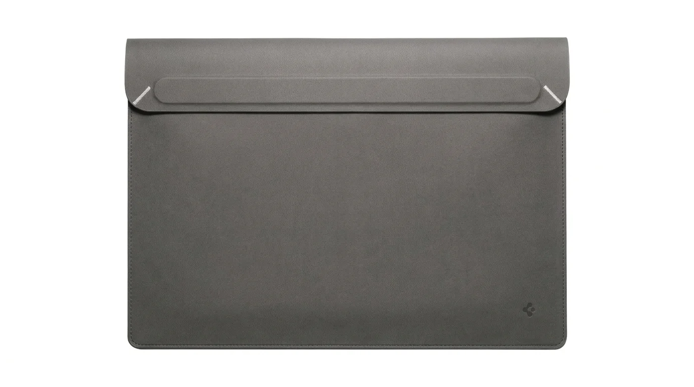 Šedé pouzdro na notebook Spigen Valentinus S 16 se zavřenou horní klopou a decentním logem.
