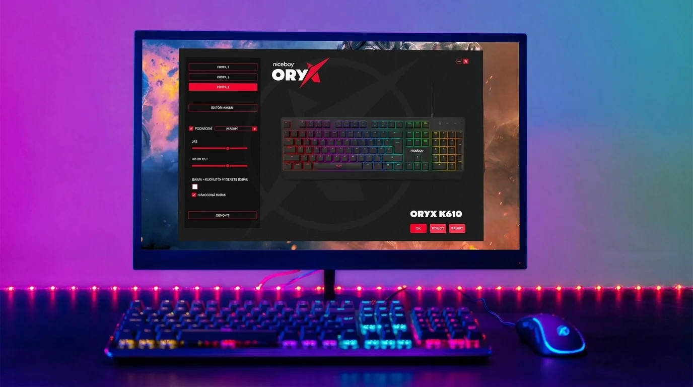 Monitor se spuštěným softwarem ORYX a před ním položená podsvícená herní klávesnice Niceboy ORYX K610 Chameleon s myší.