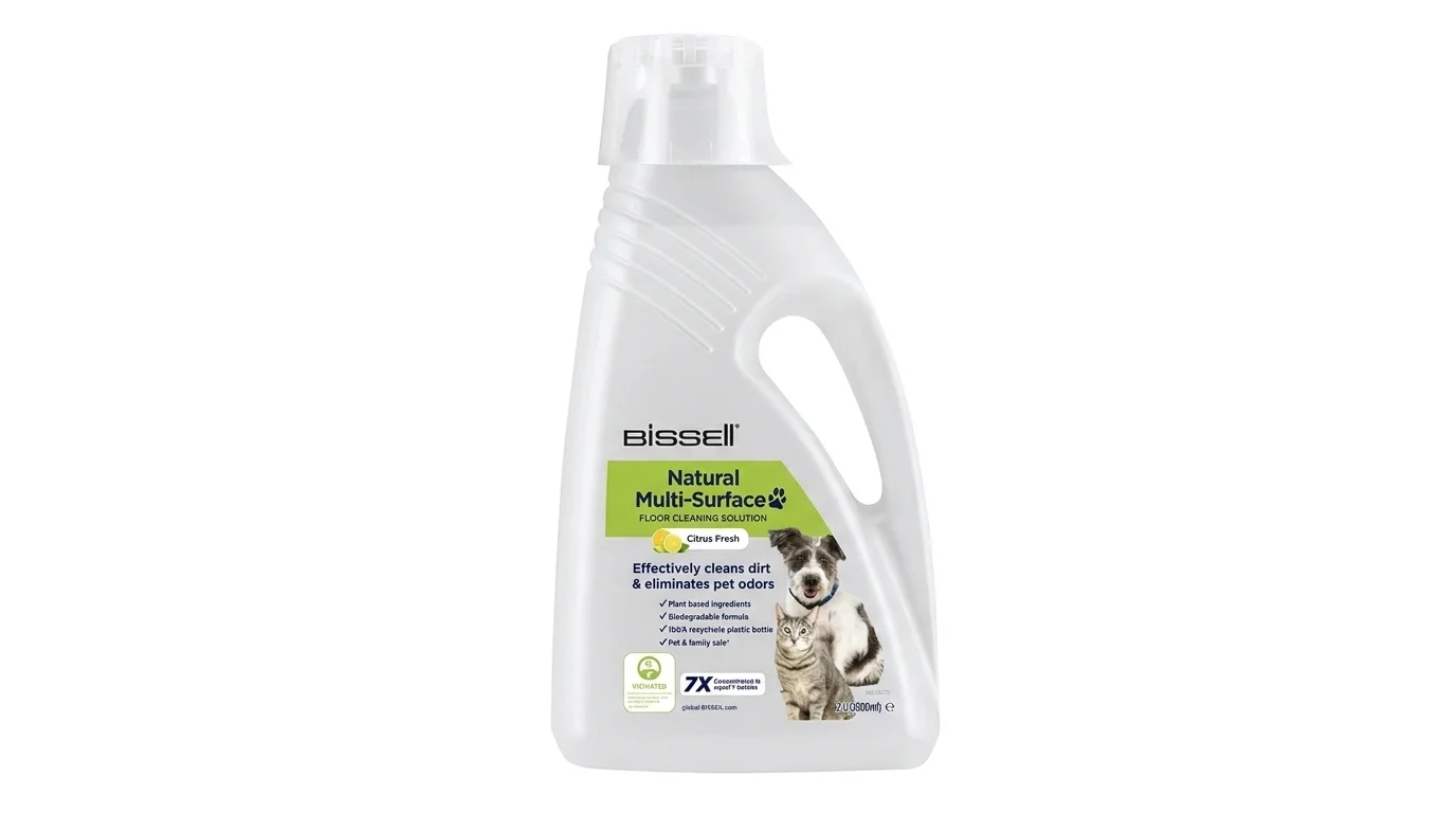 Čisticí prostředek Bissell Natural Multi-Surface Pet pro strojové mytí podlah v bílé plastové láhvi s uchem.
