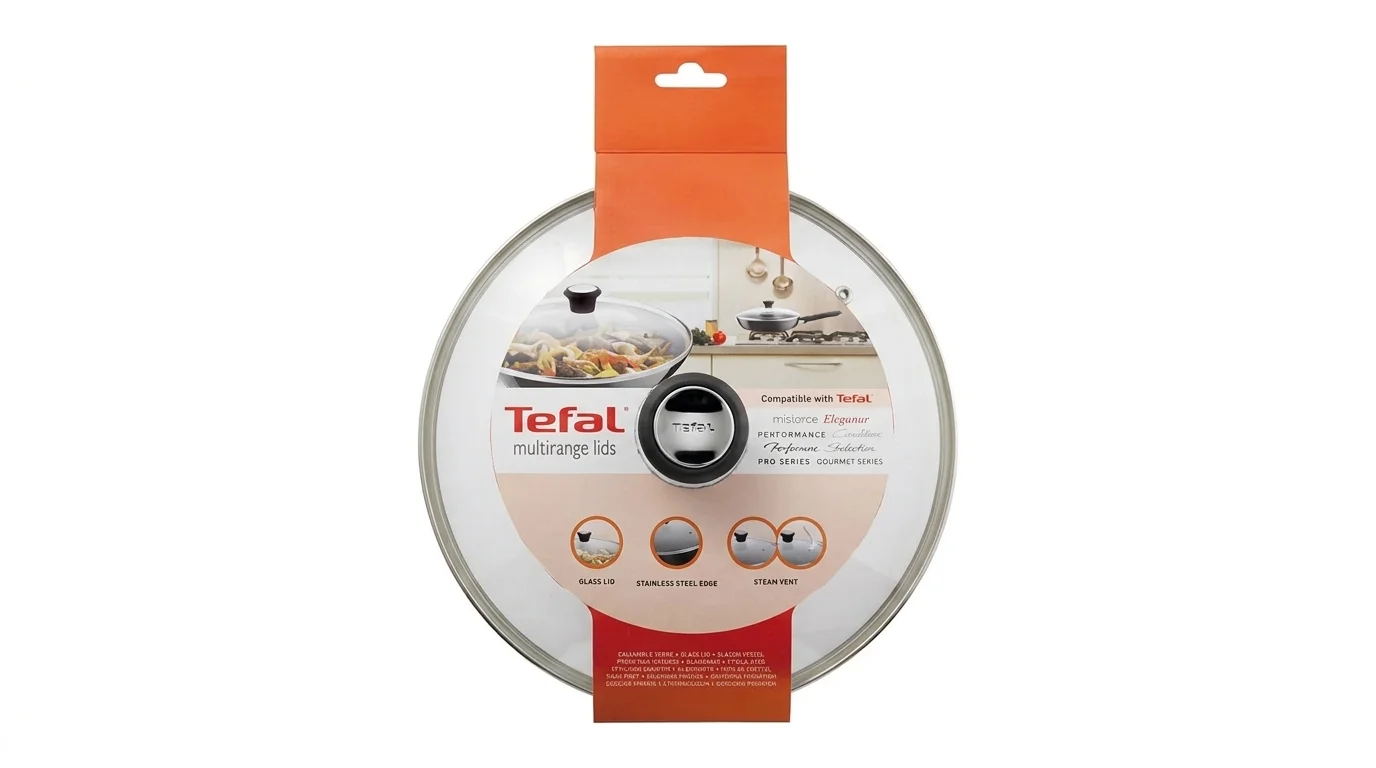 Sklenená pokrievka Tefal s nerezovým okrajom a čiernou úchytkou v originálnom balení.