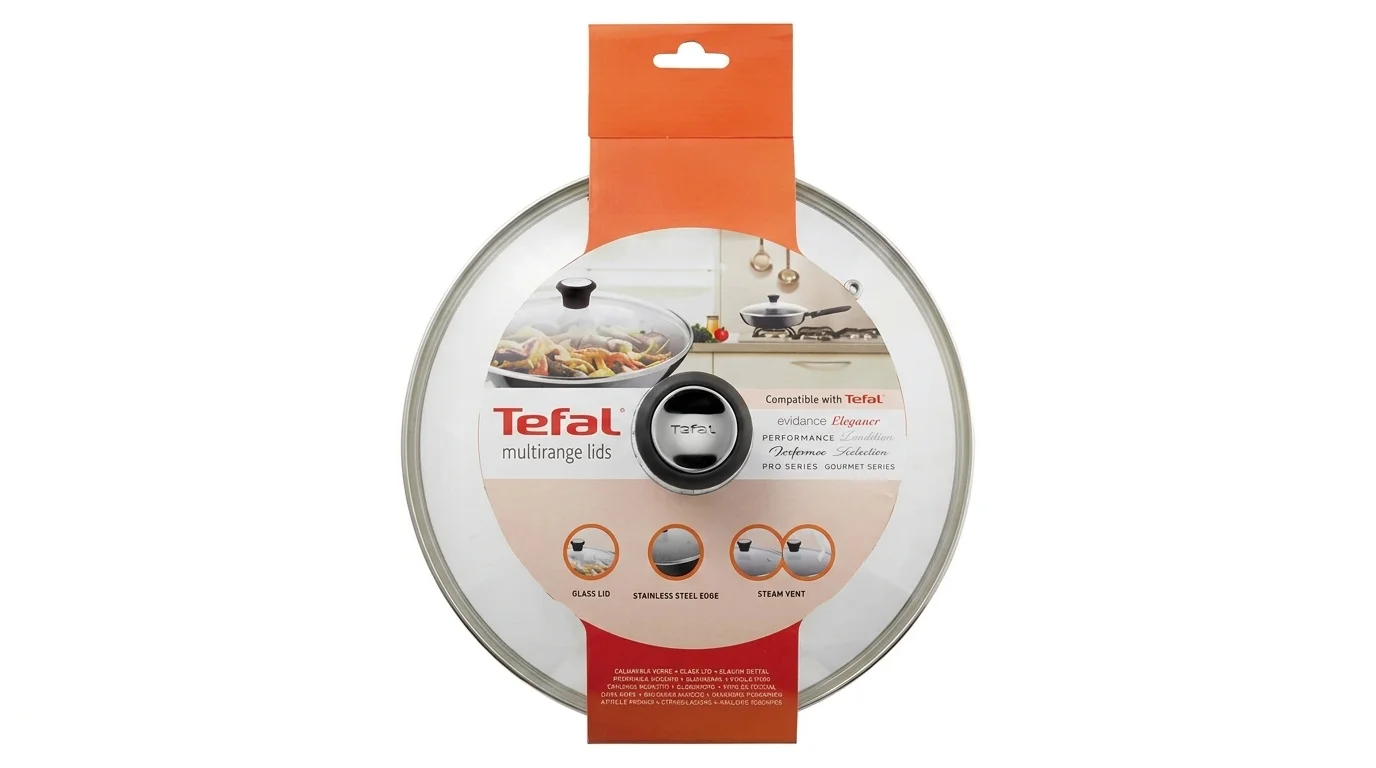 Sklenená pokrievka Tefal s nerezovým okrajom a čiernym úchytom v originálnom oranžovom balení.