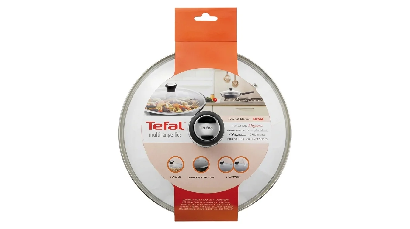 Okrúhla sklenená pokrievka Tefal s nerezovým lemom a stredovou úchytkou v originálnom predajnom balení.