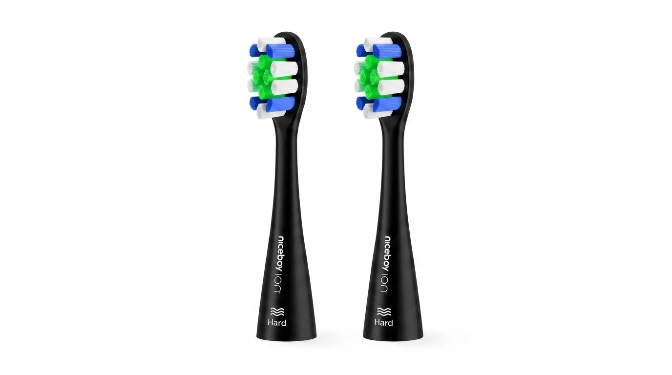 Dvě černé náhradní hlavice Niceboy ION Sonic Lite Hard s modro-zeleno-bílými štětinami na bílém pozadí.