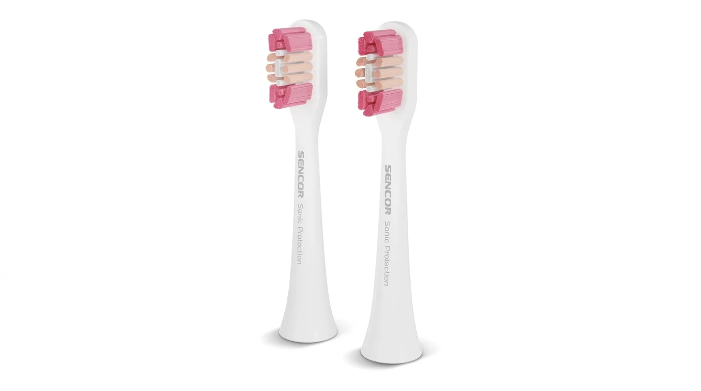 Dve biele náhradné hlavice Sencor Sonic Protection s ružovými a béžovými štetinami.