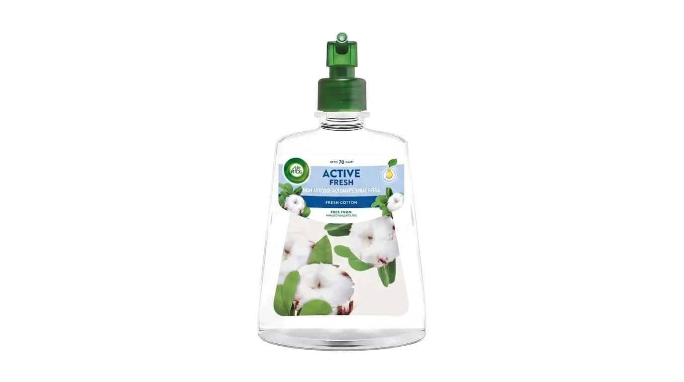 Průhledná lahvička náhradní náplně Air Wick Active Fresh s vůní Fresh Cotton a zeleným rozprašovačem.
