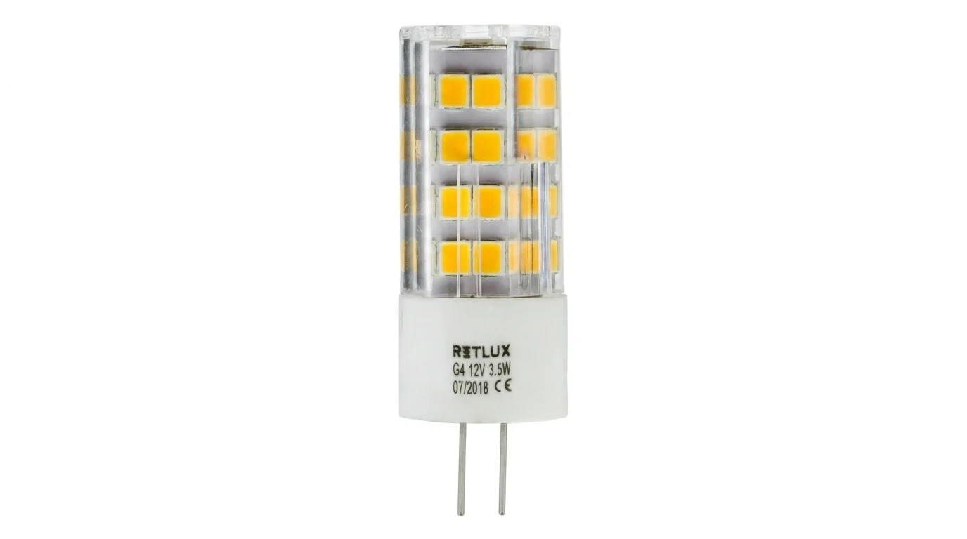 LED žiarovka Retlux s päticou G4, čírym krytom so žltými diódami, bielou základňou a dvoma pripojovacími kolíkmi.