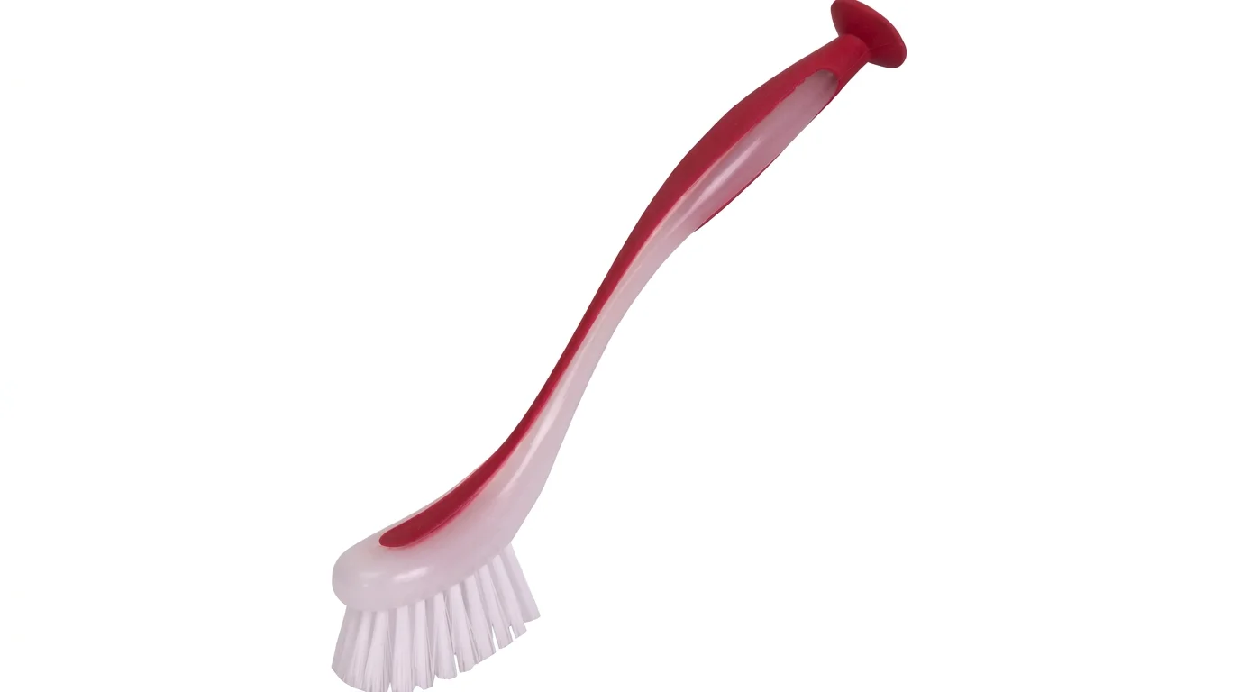 Červeno-biela kefa na riad Lamart LT8077 Clean s bielymi štetinami a prísavkou na konci rukoväti.