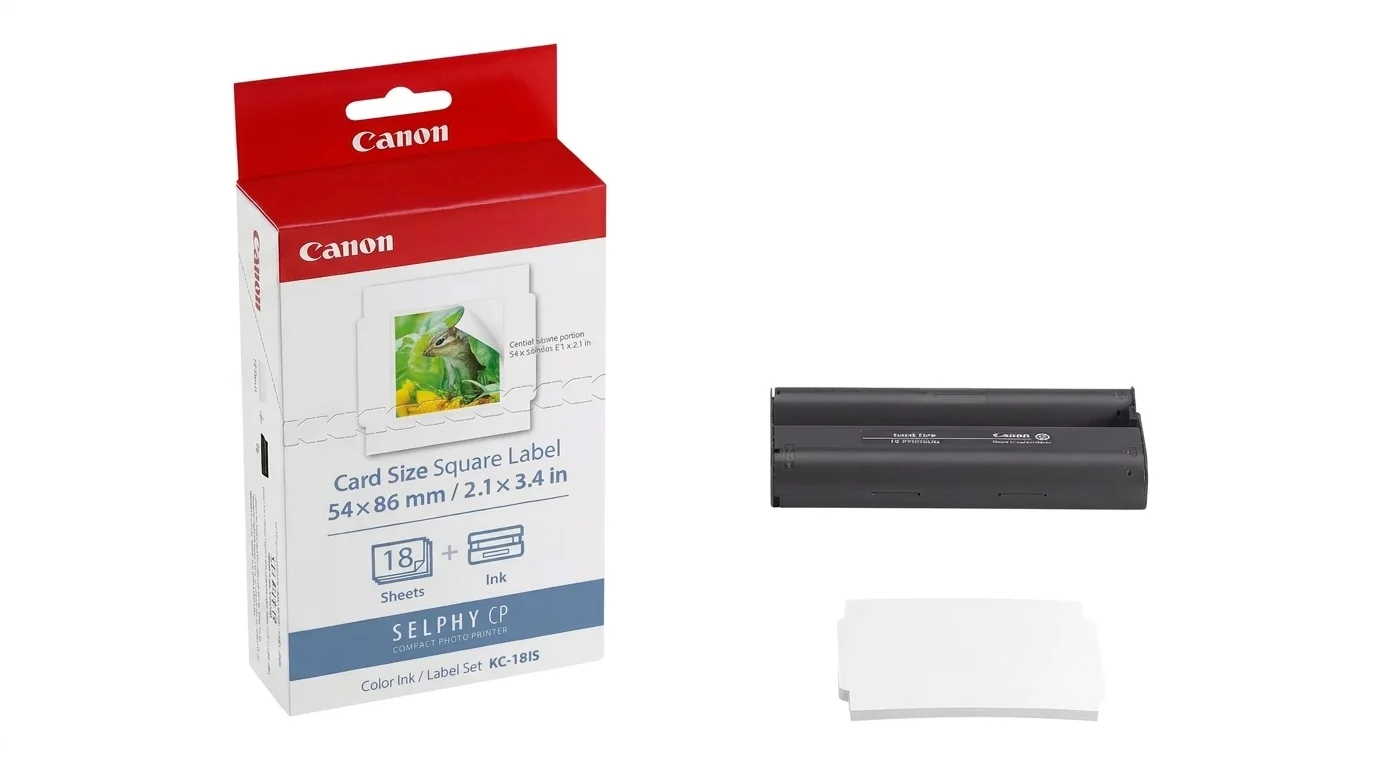 Balení fotopapíru Canon KC-18IS společně s tiskovou kazetou a sadou fotografických samolepek.