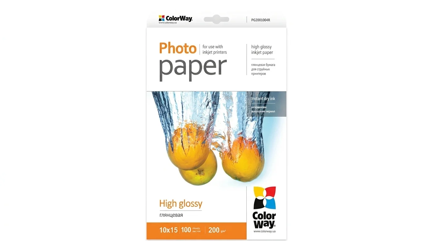 Balení fotopapíru ColorWay High Glossy 10 × 15 cm s fotografií pomerančů padajících do vody.