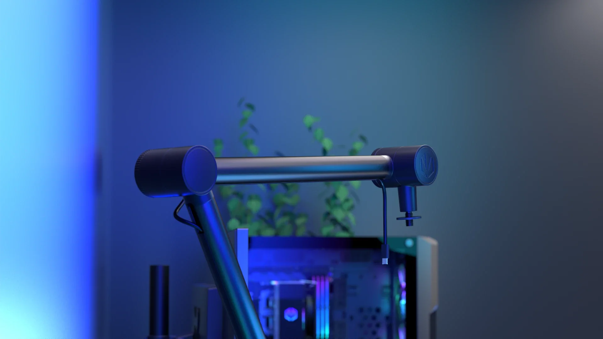 Detailní pohled na černé rameno stojanu pro mikrofon ENDORFY Studio Boom Arm s visícím kabelem na rozostřeném pozadí s modrým osvětlením.