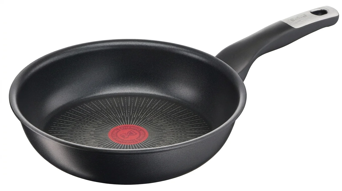 Černá nepřilnavá pánev Tefal s červeným indikátorem teploty Thermo-Signal uprostřed a rukojetí s kovovým zakončením.
